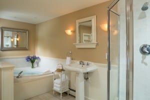A luxurious bathroom with a hot tub at the inn