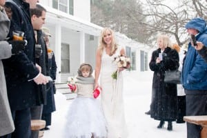 The bride walks with the flower girl